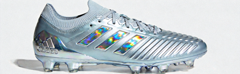 Adidas Predator Accuracy.1 足球鞋，展示其控球摩擦条和贴合鞋领